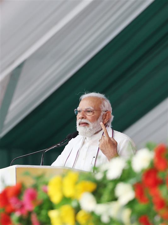 PM addressing at Akhil Bhartiya Shiksha Sangh Adhiveshan at Gandhinagar, in Gujarat on May 12, 2023.