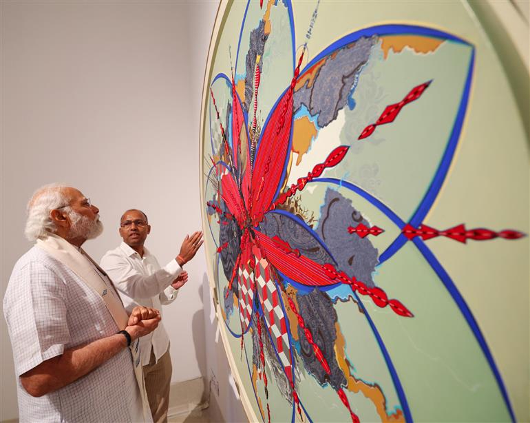 PM visits Jana Shakti exhibition at NGMA, in New Delhi on May 14, 2023.