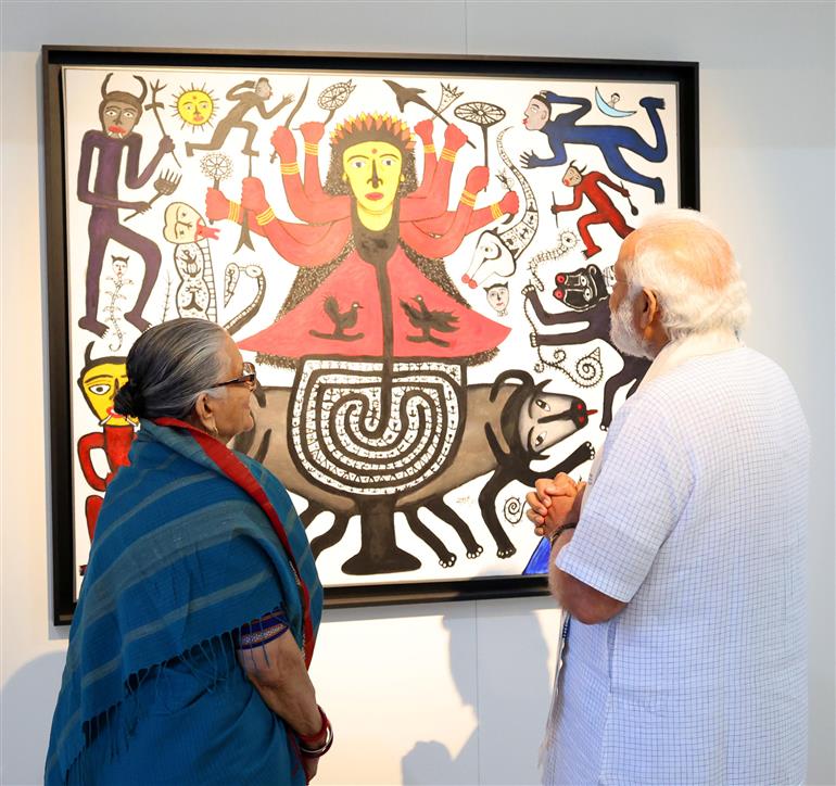 PM visits Jana Shakti exhibition at NGMA, in New Delhi on May 14, 2023.