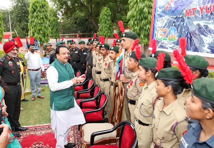 The Minister of State for Defence and Tourism, Shri Ajay Bhatt interacting with NCC Cadets  of 85th NCC  Mountaineering Expedition to Mt Yunum at HP, in New Delhi on May 17, 2023.