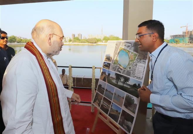 The Union Minister for Home Affairs and Cooperation, Shri Amit Shah at the Chharodi Lake constructed by AMC at Ahmedabad, in Gujarat on May 21, 2023.