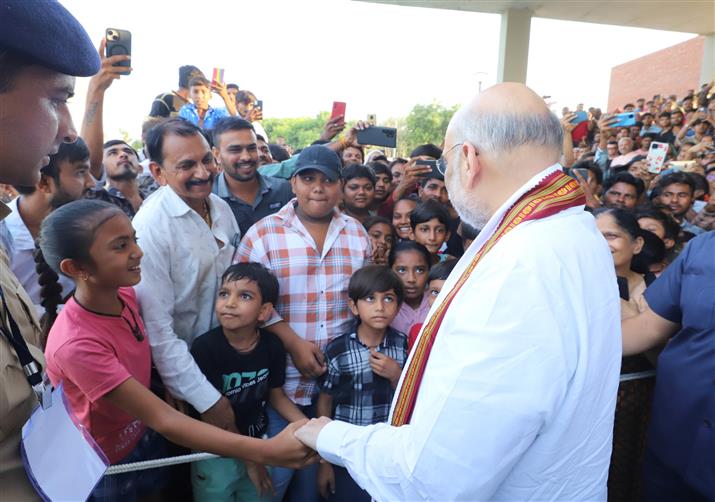 The Union Minister for Home Affairs and Cooperation, Shri Amit Shah at the Chharodi Lake constructed by AMC at Ahmedabad, in Gujarat on May 21, 2023.