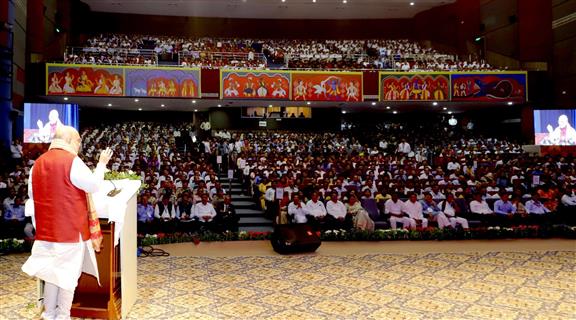 The Union Minister for Home Affairs and Cooperation, Shri Amit Shah addressing the gathering at the laying foundation stone ceremony of National Forensic Sciences University (NFSU) at Guwahati Campus, in Assam on May 25, 2023.