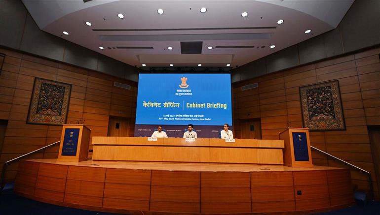 The Union Minister for Information & Broadcasting, Youth Affairs and Sports, Shri Anurag Singh Thakur briefing the media on Cabinet decisions, in New Delhi on May 31, 2023. The Minister of State for Fisheries, Animal Husbandry & Dairying, Information and Broadcasting, Dr. L. Murugan is also seen.