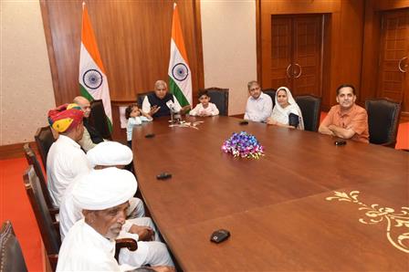 The Vice President, Shri Jagdeep Dhankhar meeting with farmer Ramu Lal Ji Bhamu and his family members from Dudu, Rajasthan along with Trustees of Shri Dhanna Bhagat Mandir at Parliament House Complex, in New Delhi on November 01, 2023.