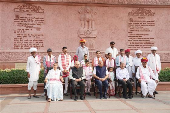 The Vice President, Shri Jagdeep Dhankhar in a group photograph with farmer Ramu Lal Ji Bhamu and his family members from Dudu, Rajasthan along with Trustees of Shri Dhanna Bhagat Mandir at Parliament House Complex, in New Delhi on November 01, 2023.