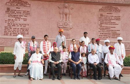 The Vice President, Shri Jagdeep Dhankhar in a group photograph with farmer Ramu Lal Ji Bhamu and his family members from Dudu, Rajasthan along with Trustees of Shri Dhanna Bhagat Mandir at Parliament House Complex, in New Delhi on November 01, 2023.