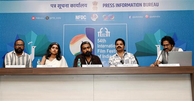 The Director of Malayalam movie Aattam, Shri Anand Ekarshi addressing a Press Conference at 54th International Film Festival of India (IFFI), in Goa on November 21, 2023. 