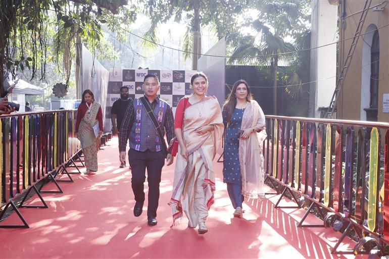 Filmmaker Shilpika Bordoloi along with the Crew- Researcher PC Lalrin Dika at the red carpet in the 54th IFFI for the screening of her film "Mau:The Spirit Dreams of Cheraw", in Goa on November 22, 2023.