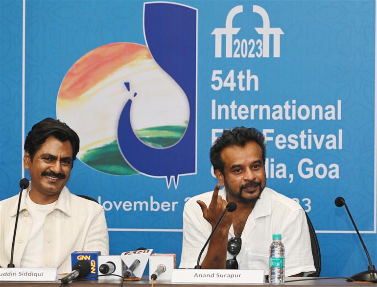 Nawazuddin Siddiqui (actor) and Anand Surapur (director) of the film "Rautu ki Beli", at the PIB Press Conference in 54th IFFI, Goa on November 25, 2023.