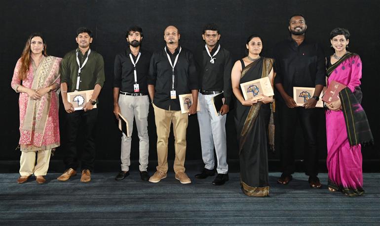 Cast and crew of Feature Film Neela Nira Sooriyan elicited at the presentation of their film at 54th IFFI, in Goa on November 26, 2023.