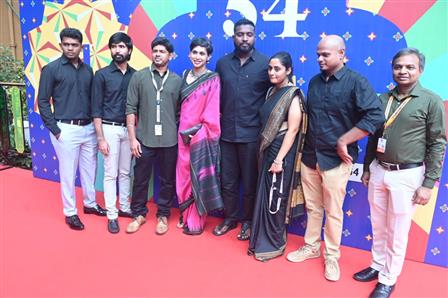 The Cast and crew of Indian panorama feature film "Neela Nira Sooriyan" on the red carpet at 54th IFFI, in Goa on November 26, 2023.