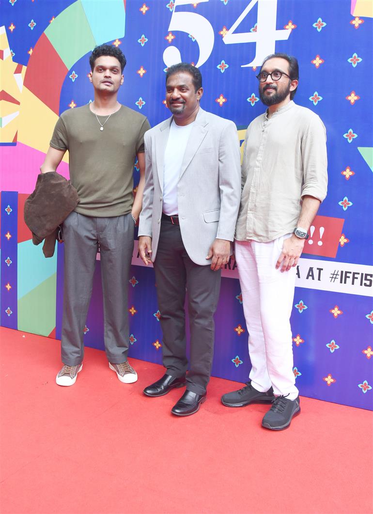 Muthaiah Muralidharan with the cast and crew of “800 The Movie” on the red carpet at 54th IFFI, in Goa on November 26, 2023.