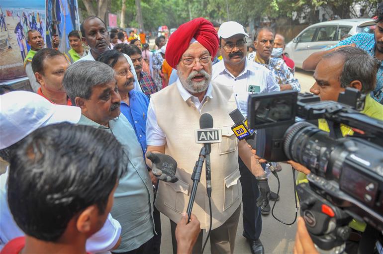 The Union Minister for Petroleum & Natural Gas, Housing and Urban Affairs, Shri Hardeep Singh Puri interacting with the media during the program “Together One Hour Shramdaan for Cleanliness” under Swachchta hi Seva campaign in the remembering the inspirations of Father of the Nation Mahatma Gandhi at Princess Park (Copernicus Marg), in New Delhi on October 01, 2023.