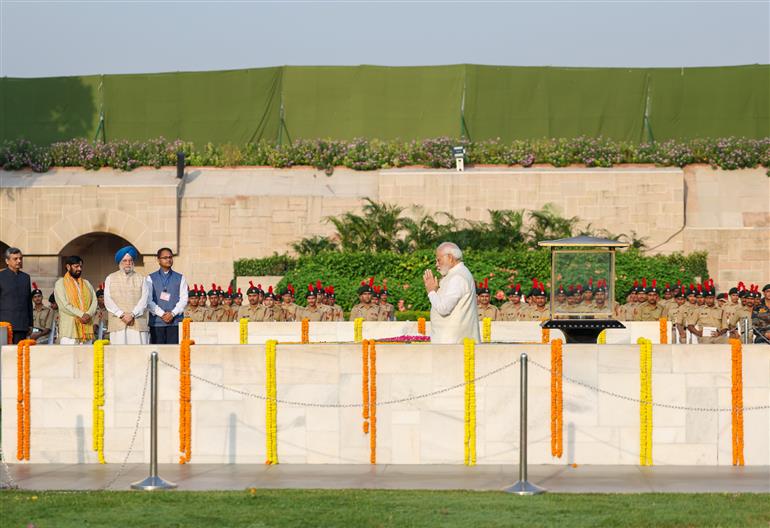 PM paying homage  at the Samadhi of Mahatma Gandhi on the occasion of Gandhi Jayanti at Rajghat, in New Delhi on October 02, 2023.