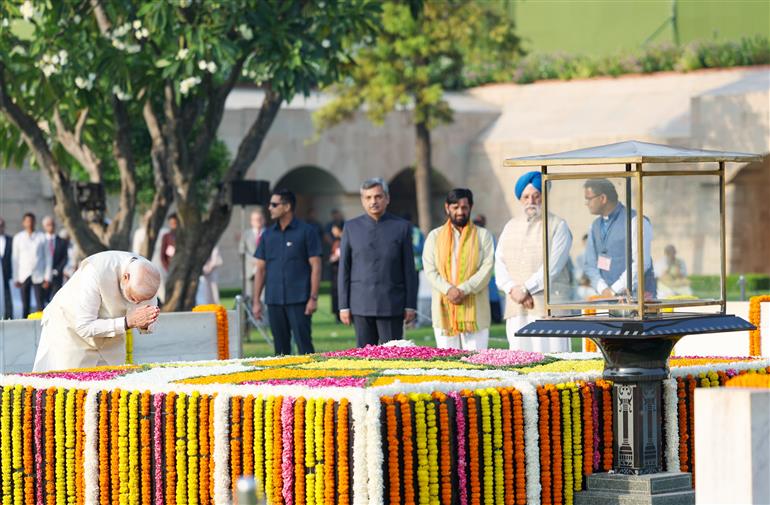 PM paying homage  at the Samadhi of Mahatma Gandhi on the occasion of Gandhi Jayanti at Rajghat, in New Delhi on October 02, 2023.