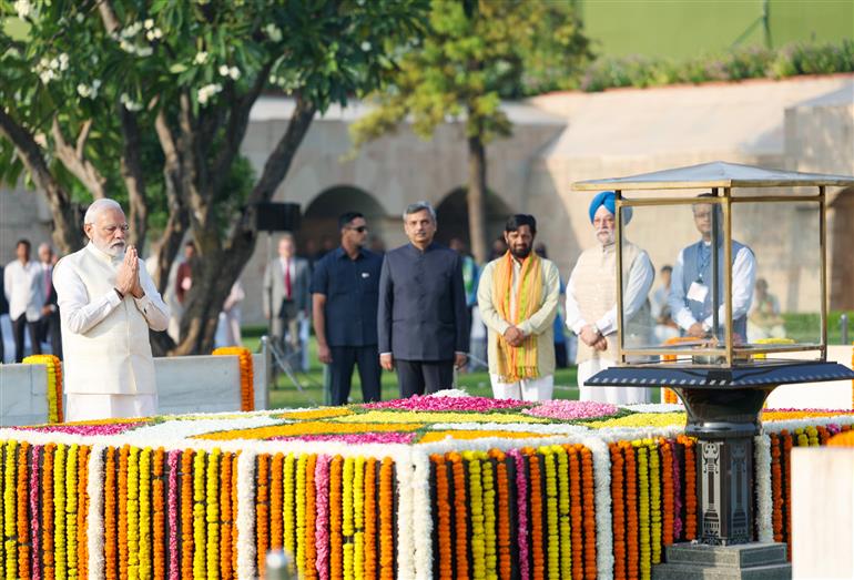 PM paying homage  at the Samadhi of Mahatma Gandhi on the occasion of Gandhi Jayanti at Rajghat, in New Delhi on October 02, 2023.