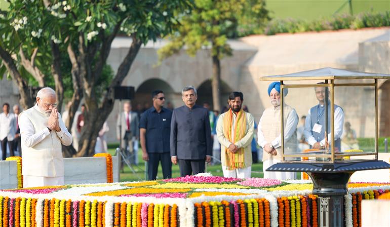 PM paying homage  at the Samadhi of Mahatma Gandhi on the occasion of Gandhi Jayanti at Rajghat, in New Delhi on October 02, 2023.