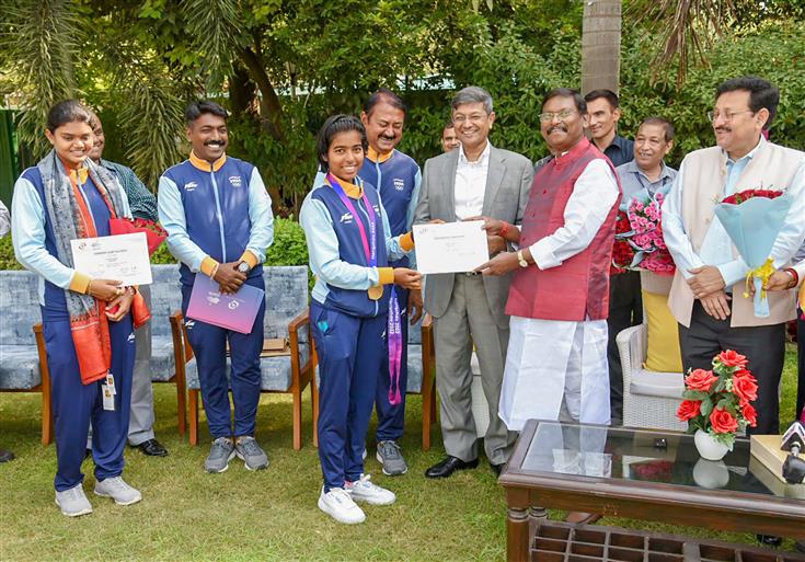 The Union Minister for Tribal Affairs, Shri Arjun Munda confers to medal-winning Indian Archery contingent from Asian Games at his residence, in New Delhi on October 10, 2023.