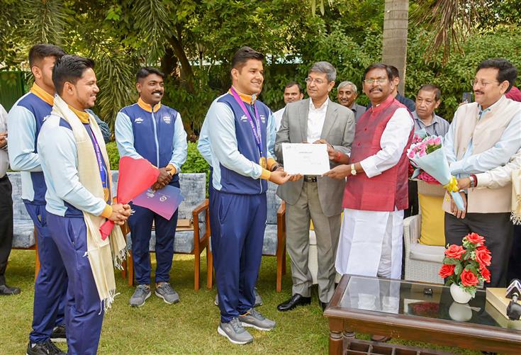 The Union Minister for Tribal Affairs, Shri Arjun Munda confers to medal-winning Indian Archery contingent from Asian Games at his residence, in New Delhi on October 10, 2023.