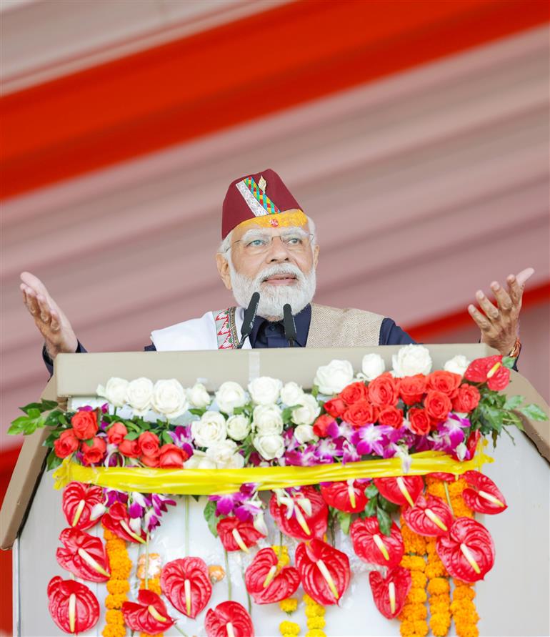 PM addressing at the laying foundation stone of various projects at Pithoragarh, in Uttarakhand on October 12, 2023.