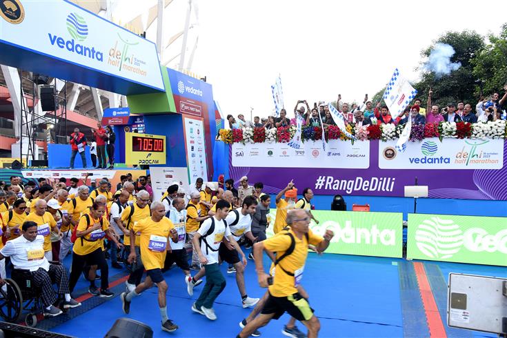 The Union Minister for Information & Broadcasting, Youth Affairs and Sports, Shri Anurag Singh Thakur flags off 'Vedanta Delhi Half Marathon' at Jawaharlal Nehru Stadium, in New Delhi on October 15, 2023.