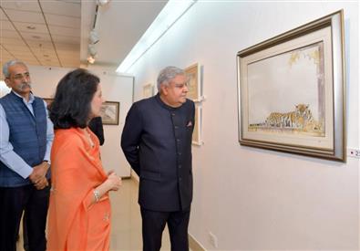 The Vice President, Shri Jagdeep Dhankhar visits an exhibition of charcoal sketches of tigers and water colour florals by Smt. Charumati Nirwan at All India Fine Arts & Crafts Society, in New Delhi on October 20, 2023.