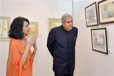 The Vice President, Shri Jagdeep Dhankhar visits an exhibition of charcoal sketches of tigers and water colour florals by Smt. Charumati Nirwan at All India Fine Arts & Crafts Society, in New Delhi on October 20, 2023.