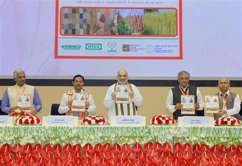 The Union Minister for Home Affairs and Cooperation, Shri Amit Shah unveils the Logo, Website and Brochure of Bharatiya Beej Sahkari Samiti Limited (BBSSL) during “National Symposium on Production of Improved and Traditional Seed in Cooperative Sector”, in New Delhi on October 26, 2023.