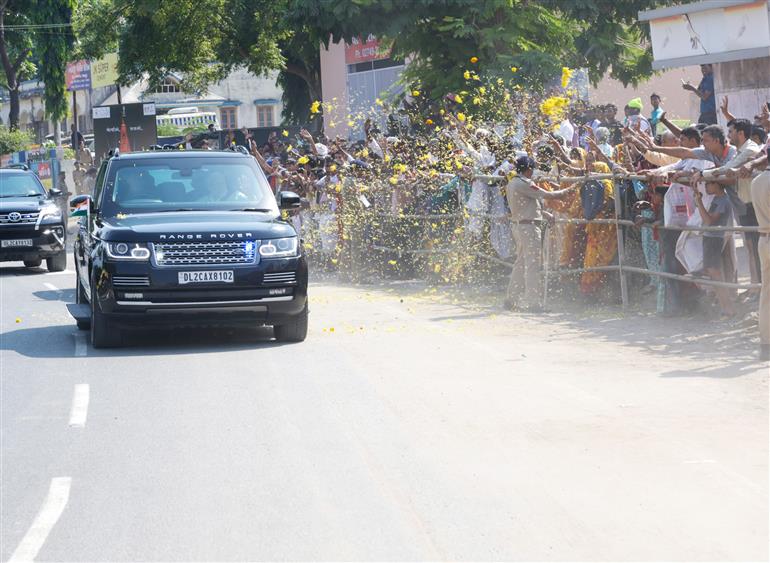 PM receives warm welcome by people on his arrival at Banaskantha, in Gujarat on October 30, 2023.