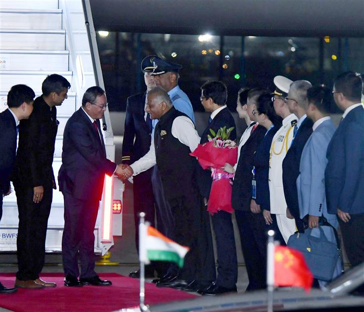 Premier of the People’s Republic of China, Mr. Li Qiang receives warm welcome by the Minister of State for Road Transport & Highways and Civil Aviation, General (Retd.) V.K. Singh on his arrival for the G20 Summit at Palam Airforce Airport, in New Delhi on September 08, 2023.