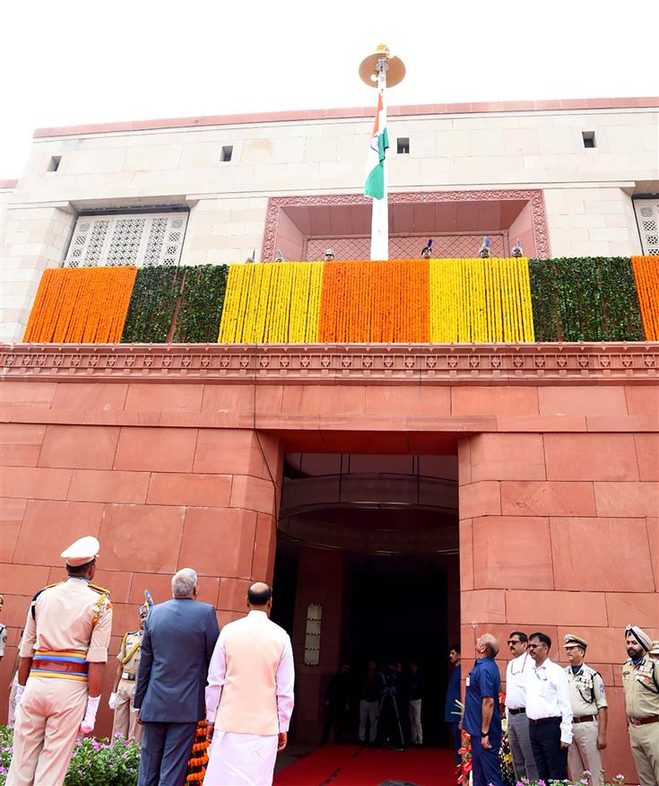 The Vice President and Chairman of Rajya Sabha, Shri Jagdeep Dhankhar hoists the National flag at the Gaja Dwar of the New Parliament Building in presence of the Speaker of Lok Sabha, Shri Om Birla, in New Delhi on September 17, 2023.