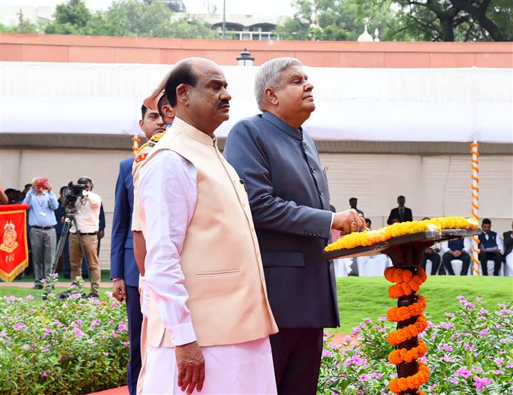 The Vice President and Chairman of Rajya Sabha, Shri Jagdeep Dhankhar hoists the National flag at the Gaja Dwar of the New Parliament Building in presence of the Speaker of Lok Sabha, Shri Om Birla, in New Delhi on September 17, 2023.