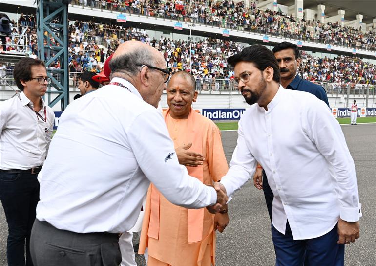 The Union Minister for Information & Broadcasting, Youth Affairs and Sports, Shri Anurag Singh Thakur, the Union Minister for Petroleum & Natural Gas, Housing and Urban Affairs, Shri Hardeep Singh Puri and the Chief Minister of Uttar Pradesh, Yogi Adityanath at the MotoGP Grand Prix 2023 in Buddh International Circuit, Greater Noida on September 24, 2023.