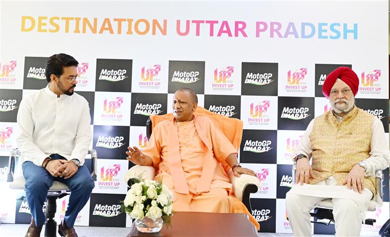The Union Minister for Information & Broadcasting, Youth Affairs and Sports, Shri Anurag Singh Thakur, the Union Minister for Petroleum & Natural Gas, Housing and Urban Affairs, Shri Hardeep Singh Puri and the Chief Minister of Uttar Pradesh, Yogi Adityanath at the MotoGP Grand Prix 2023 in Buddh International Circuit, Greater Noida on September 24, 2023.