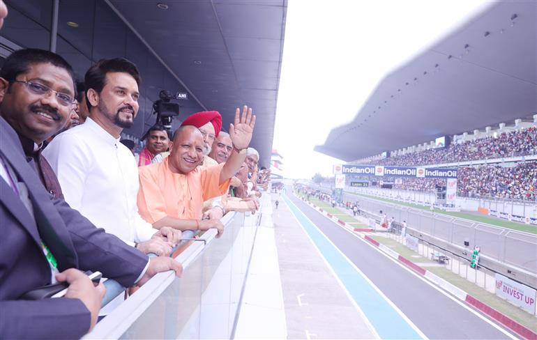 The Union Minister for Information & Broadcasting, Youth Affairs and Sports, Shri Anurag Singh Thakur, the Union Minister for Petroleum & Natural Gas, Housing and Urban Affairs, Shri Hardeep Singh Puri and the Chief Minister of Uttar Pradesh, Yogi Adityanath at the MotoGP Grand Prix 2023 in Buddh International Circuit, Greater Noida on September 24, 2023.