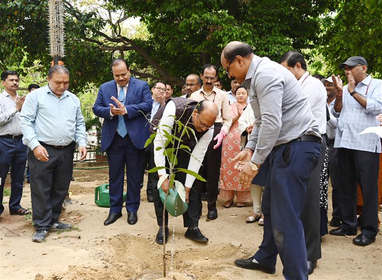 The Secretary, Legislative Department, Dr. Rajiv Mani planting a sapling under Swachhata Pakhwada organised by Legislative Department, in New Delhi on April 15, 2024.