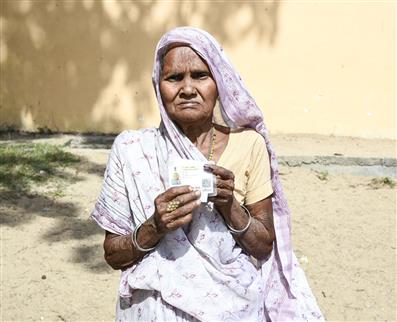 An elderly woman voter showing mark of indelible ink after casting her vote, at a polling booth, during the 1st Phase of General Elections-2024 at Kendriya Vidyalaya No.1, Bageshwari Road, Gaya, in Bihar on April 19, 2024.