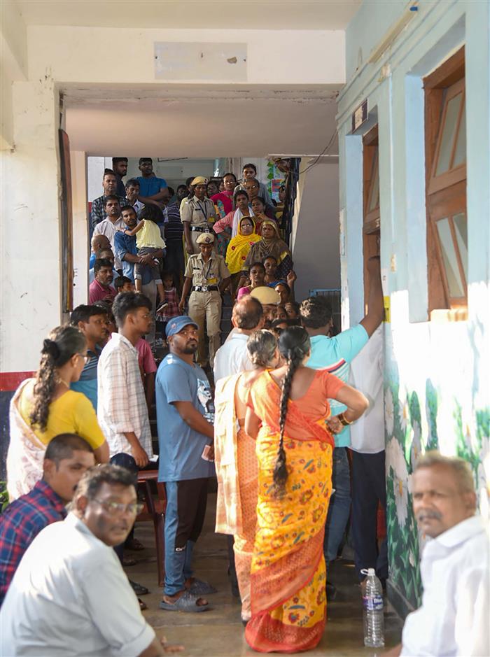 A voters standing in the queue to cast their votes, at a polling booth, during the 1st Phase of General Elections-2024 at Port Blair, in Andaman and Nicobar Islands on April 19, 2024.