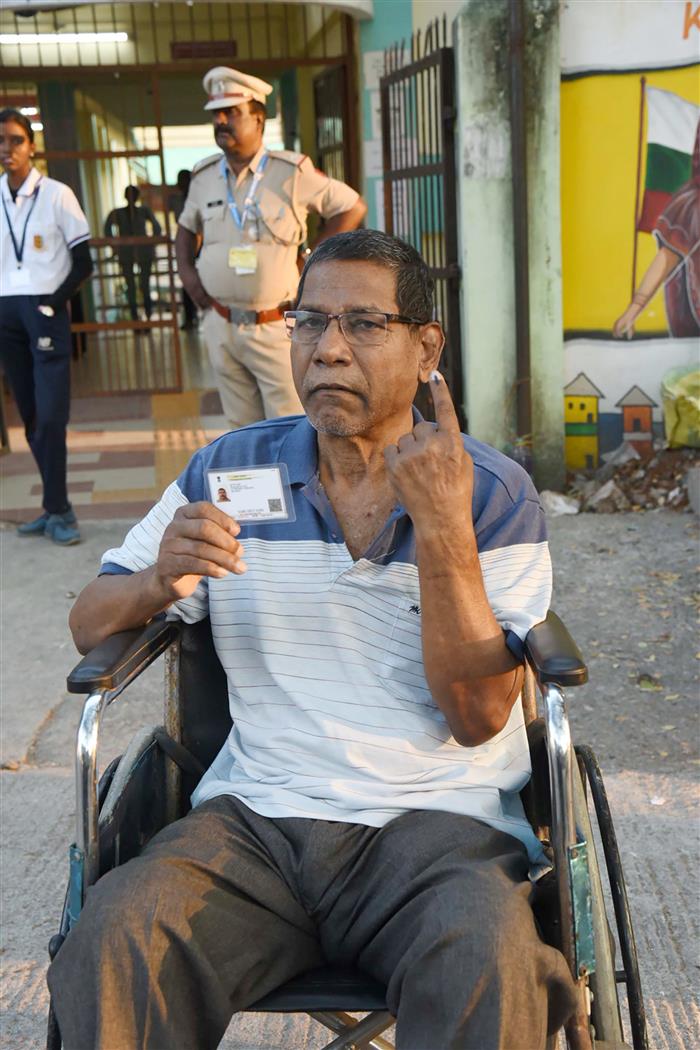 A divyang voter showing mark of indelible ink after casting her vote, at a polling booth, during the 1st Phase of General Elections-2024 at Port Blair, in Andaman and Nicobar Islands on April 19, 2024.