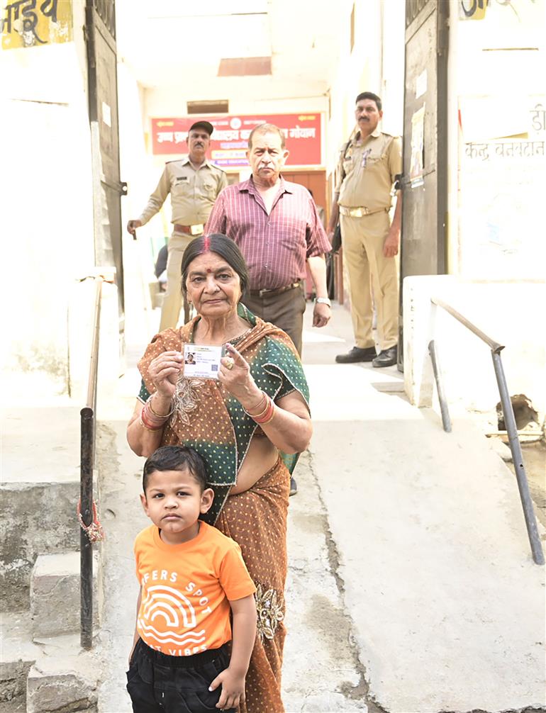 Elderly voter showing mark of indelible ink after casting their votes at a polling booth during the 2nd Phase of General Elections-2024 at Ucch Prathmik Vidyalaya, Meerut, in Uttar Pradesh on April 26, 2024.