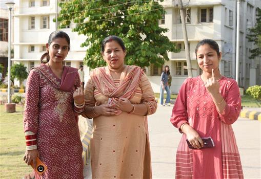 Female voters showing mark of indelible ink after casting their votes during the IInd Phase of General Elections-2024 at Indian Institute of Management, in Jammu on April 26, 2024.