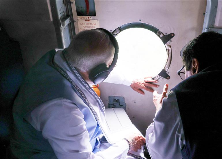 PM conducts aerial survey of landslide affected areas at Wayanad, in Kerala on August 10, 2024.