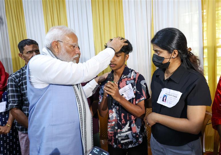 PM meets the victims and survivors of Wayanad landslide at relief camp, Wayanad, in Kerala on August 10, 2024.