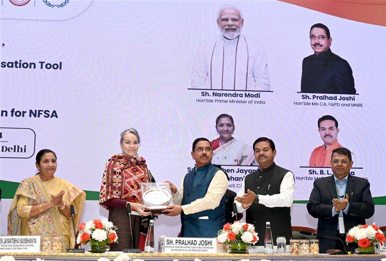 The Union Minister for Consumer Affairs, Food and Public Distribution & New and Renewable Energy, Shri Pralhad Joshi at the launch of Anna Chakra, a PDS Supply Chain Optimisation Tool and SCAN portal subsidy claim application for the National Food Security Act, NFSA, in New Delhi on December 05, 2024. The Minister of State for Consumer Affairs, Food and Public Distribution and Social Justice and Empowerment, Shri B. L. Verma and the Minister of State for Consumer Affairs, Food and Public Distribution, Smt. Nimuben Jayantibhai Bambhaniya are also present.
