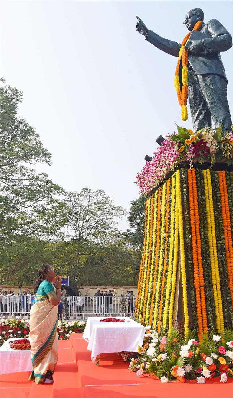 The President of India, Smt Droupadi Murmu paying floral tributes to Babasaheb Dr B.R. Ambedkar on his Mahaparinirvan Diwas at Bhubaneswar, in Odisha on December 06, 2024.