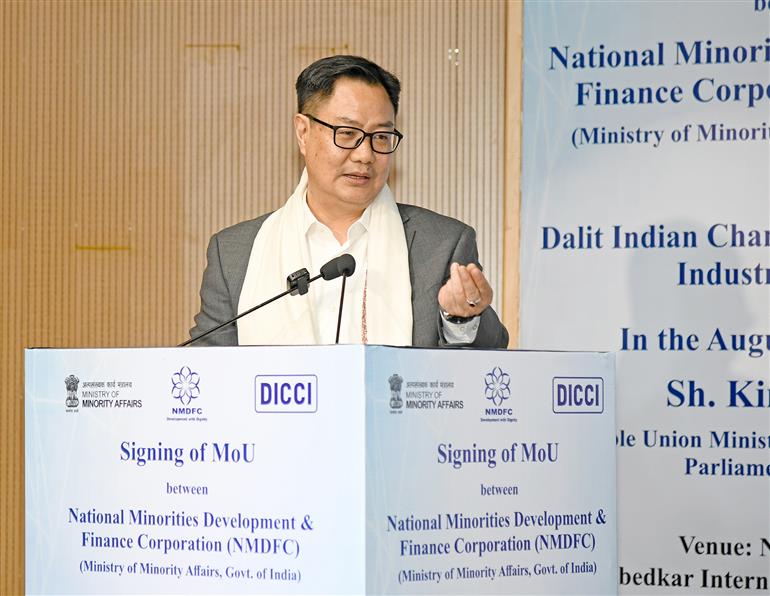The Union Minister of Parliamentary Affairs and Minority Affairs, Shri Kiren Rijiju addressing the gathering during the Signing a Memorandum of Understanding (MoU) ceremony between National Minorities Development & Finance Corporation (NMDFC) and Dalit Indian Chamber of Commerce & Industry (DICCI) at Dr. Ambedkar International Centre, in New Delhi on December 07, 2024.