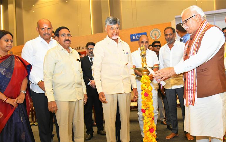 The Union Minister of Housing and Urban Affairs & Power, Shri Manohar Lal lighting the lamp at the inaugural of “Energy Efficiency Programs in Andhra Pradesh” at Poranki, in Andhra Pradesh on December 07, 2024. The Chief Minister of Andhra Pradesh, Shri N. Chandra Babu Naidu and the Union Minister of State for Heavy Industries and Steel, Shri Bhupathi Raju Srinivasa Varma are also seen.
