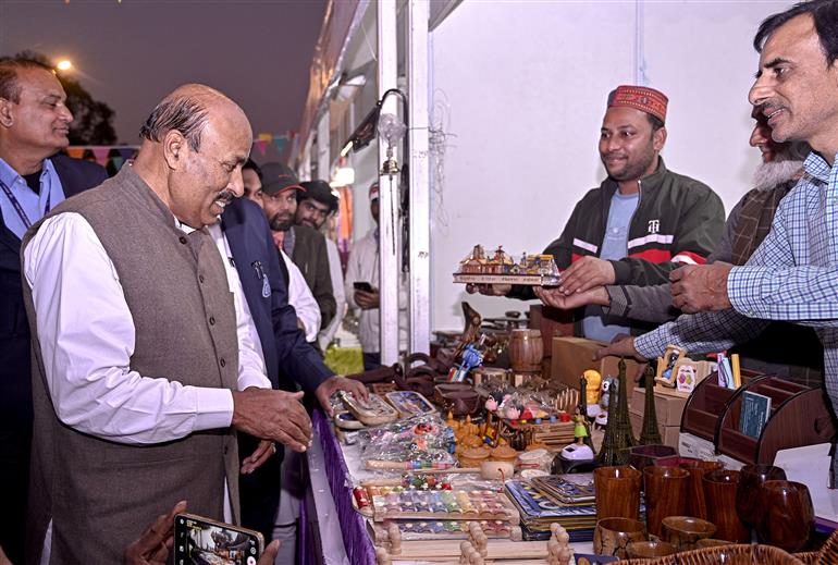 The Union Minister of Social Justice and Empowerment, Dr. Virendra Kumar visits an exhibition during the inauguration the 22nd Divya Kala Mela, in New Delhi on December 12, 2024.
