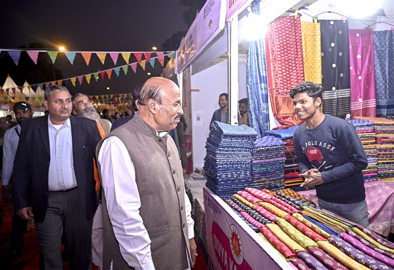 The Union Minister of Social Justice and Empowerment, Dr. Virendra Kumar visits an exhibition during the inauguration the 22nd Divya Kala Mela, in New Delhi on December 12, 2024.